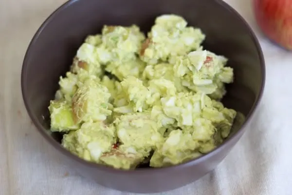 egg salad made with avocado in brown bowl