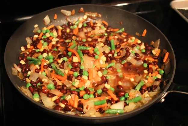 mixed veggies cooking on stove top