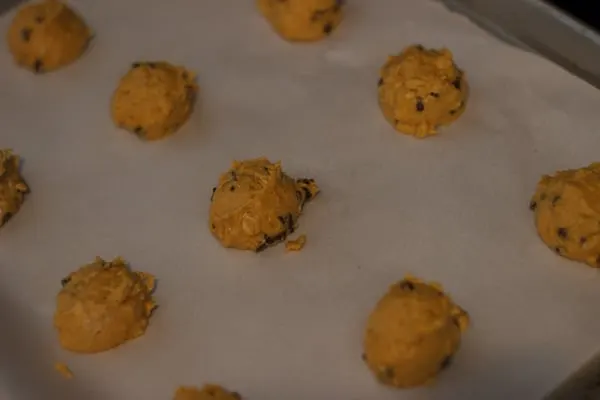 Pumpkin Oatmeal Chocolate Chip Cookies on baking pan 