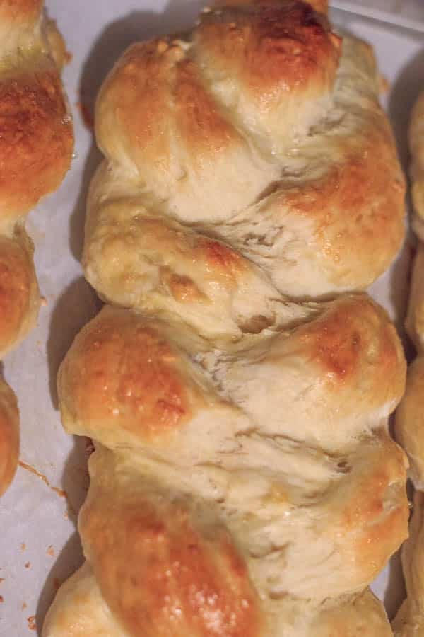 close up of baked challah bread