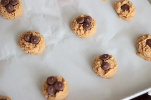 Peanut butter cup cookies - a delicious cookie with mini peanut butter cups baked in! Best served with a tall glass of chocolate milk.