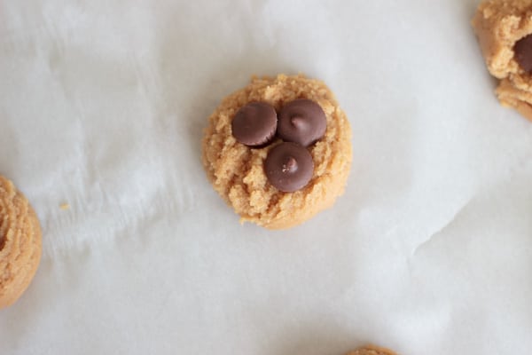 Peanut butter cup cookies - a delicious cookie with mini peanut butter cups baked in! Best served with a tall glass of chocolate milk.