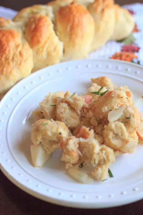 This vegetarian challah bread stuffing will be great at your Thanksgiving table. Cooked on the stovetop to save oven space, added apples for crunch, and garnished with fresh rosemary.