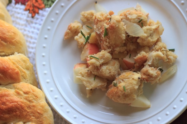 This vegetarian challah bread stuffing will be great at your Thanksgiving table. Cooked on the stovetop to save oven space, added apples for crunch, and garnished with fresh rosemary. 