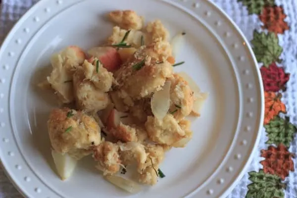 serving of challah apple dressing on white plate