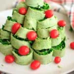 A Christmas tree pita pinwheel appetizer that is an adorable hit for any holiday party. Customizable and easy finger food!