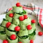 A Christmas tree pita pinwheel appetizer that is an adorable hit for any holiday party. Customizable and easy finger food!