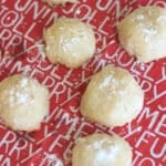 Coconut snowball cookies are the perfect festive treat for the holidays, Christmas parties and gifts. Only 4 ingredients needed!