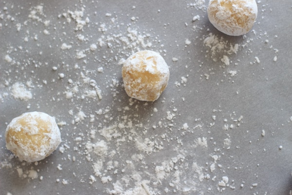 Coconut snowball cookies are the perfect festive treat for the holidays, Christmas parties and gifts. Only 4 ingredients needed!