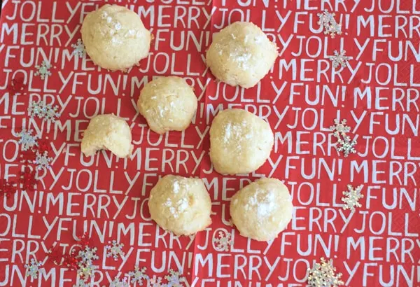 Coconut snowball cookies are the perfect festive treat for the holidays, Christmas parties and gifts. Only 4 ingredients needed!