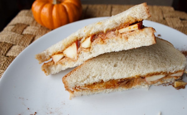 Peanut butter, pumpkin butter and apple sandwich. A unique, crunchy and flavorful combination for all your autumn cravings.