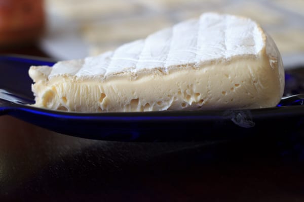a thick wedge of brie cheese