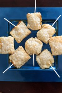 These baked brie pops will be a hit at any party! A great alternative to the traditional appetizer of cheese and crackers. | trialandeater.com