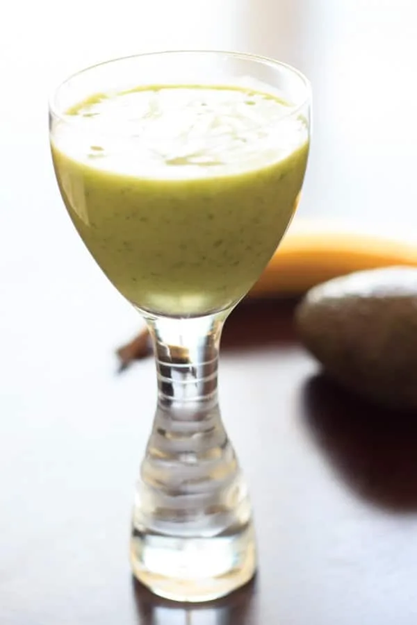 An avocado banana smoothie that is sure to brighten up your day! Creamy, fruity, and oh so good.