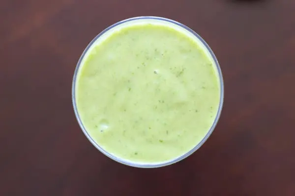 An avocado banana smoothie that is sure to brighten up your day! Creamy, fruity, and oh so good.