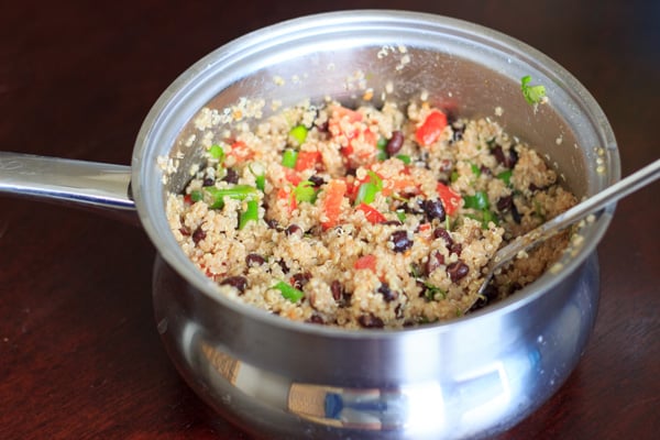 Black bean quinoa salad - flavorful, fast and filling. Another great way to enjoy quinoa in a vegan, gluten-free way. This was a hit for vegetarians and non-vegetarians alike!