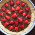 Nutella pudding with a homemade tart crust topped with strawberries. Because fruit + chocolate = healthy dessert!