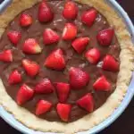 Nutella pudding with a homemade tart crust topped with strawberries. Because fruit + chocolate = healthy dessert!