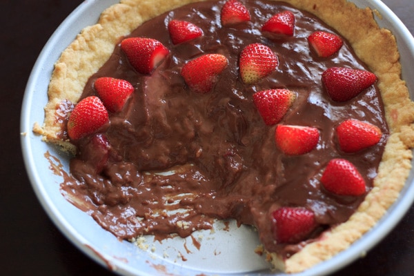 Nutella pudding with a homemade tart crust topped with strawberries. Because fruit + chocolate = healthy dessert!