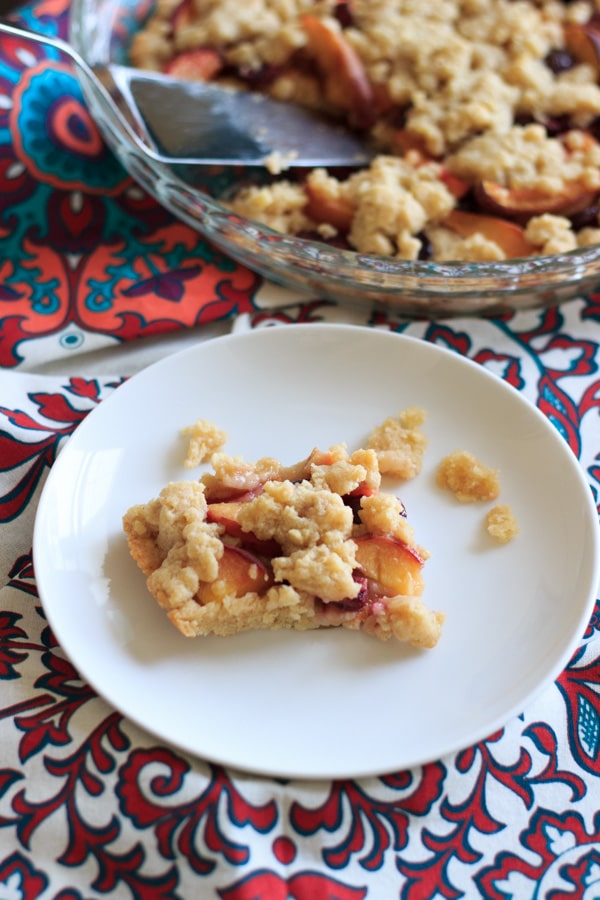 Cherry peach crumb bars - perfectly balanced with just the right amount of fruit and just the right amount of crust! | trialandeater.com