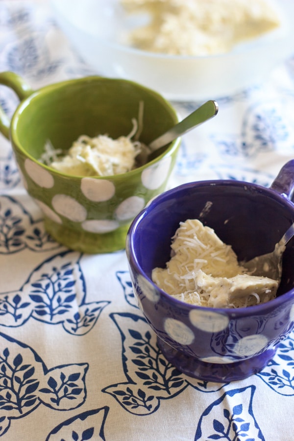 two servings of coconut kiwi ice cream in mugs