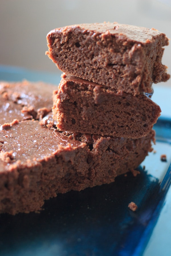 Skinny chocolate brownies made with applesauce and Greek yogurt that are almost cupcake-like in texture. These healthy (or at least healthier) brownies make for a great guilt-free dessert. | trialandeater.com