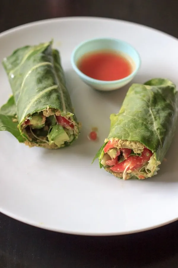 Vegan and gluten free wrap made with collard greens, veggies and sunflower hummus.