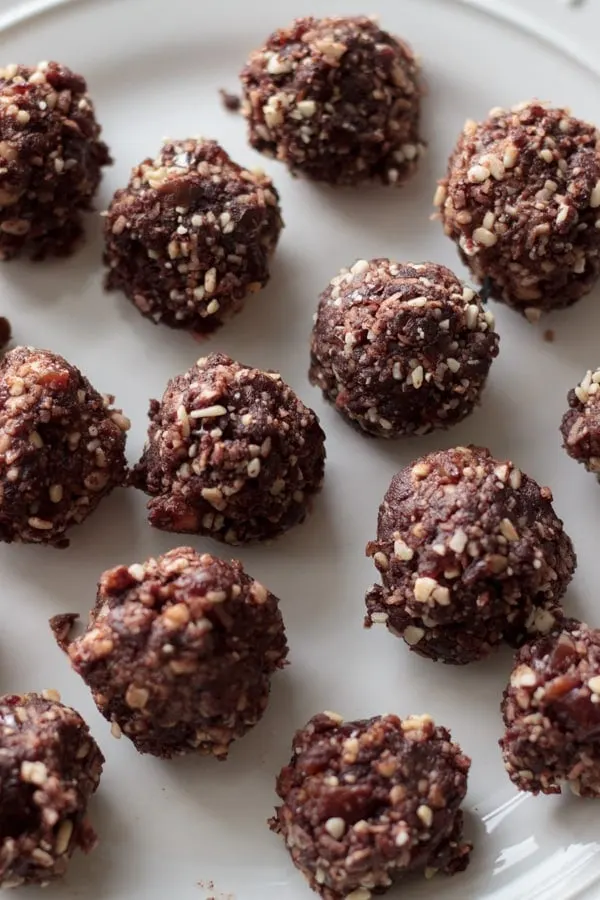 Close-up of almond joy energy bites before topping with coconut flakes