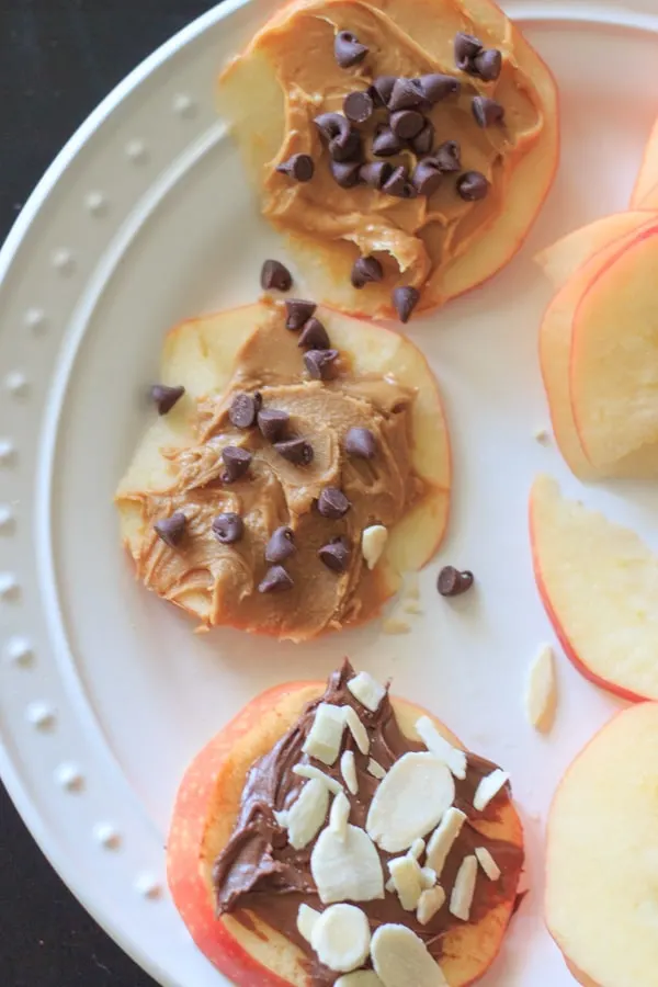Apple cookies are a fun way to get your apple a day! Load up slices of apple with your favorite toppings for a sweet, satisfying, guilt-free snack!