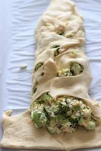Broccoli and cheese goodness all wrapped up in crescent roll dough. Easy, quick dinner, made healthy by swapping out the mayonnaise!