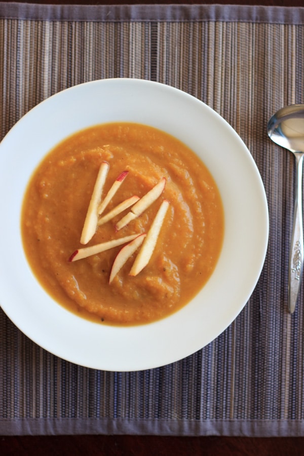 Butternut squash apple soup. Delicious autumn flavors blended together make this vegan soup a crowd-pleasing appetizer.