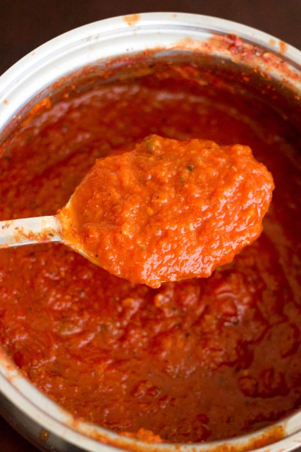 Big spoonful of homemade marinara sauce