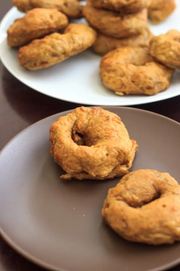 pumpkin bagels on brown plate