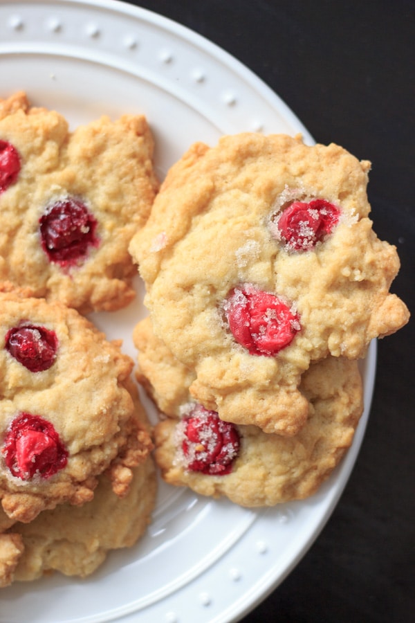 close up on a pile of sugared cranberry cookies