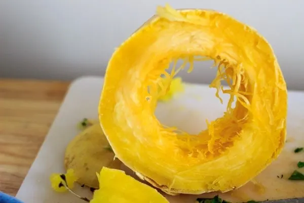 a ring of spaghetti squash on cutting board