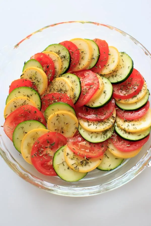 Healthy Squash and Tomato Casserole - Summer squash, zucchini, tomato and herbs make this colorful and healthy side dish a great vegan addition to any summer meal.