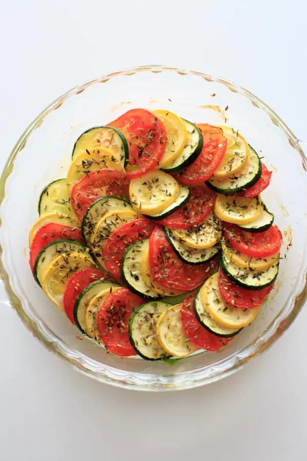 Healthy Squash and Tomato Casserole - Summer squash, zucchini, tomato and herbs make this colorful and healthy side dish a great vegan addition to any summer meal.