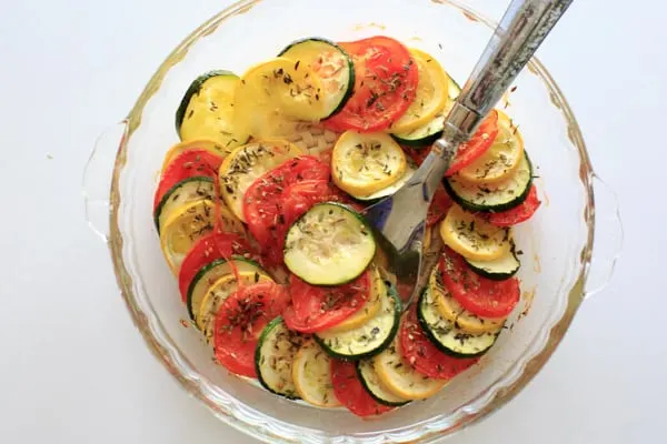 Healthy Squash and Tomato Casserole - Summer squash, zucchini, tomato and herbs make this colorful and healthy side dish a great vegan addition to any summer meal.