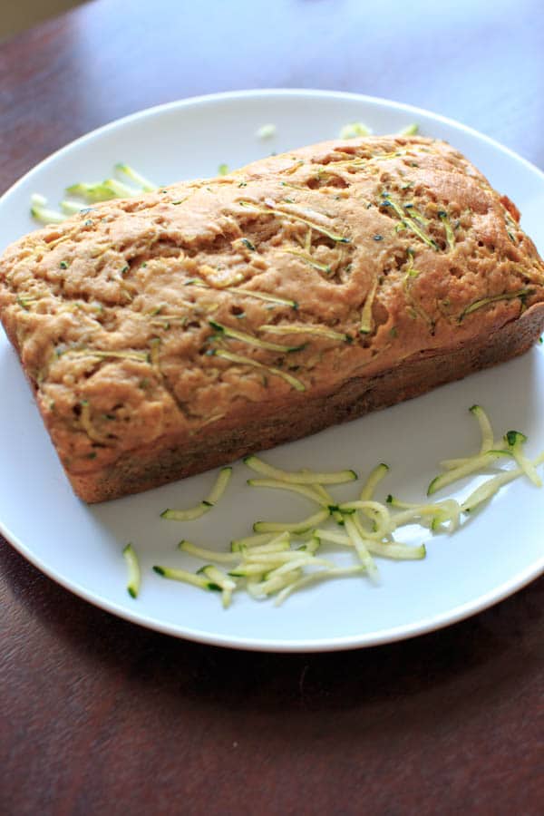 Skinnier Zucchini Bread - made with applesauce and less sugar so you don't feel as much guilt for that second or third slice. 