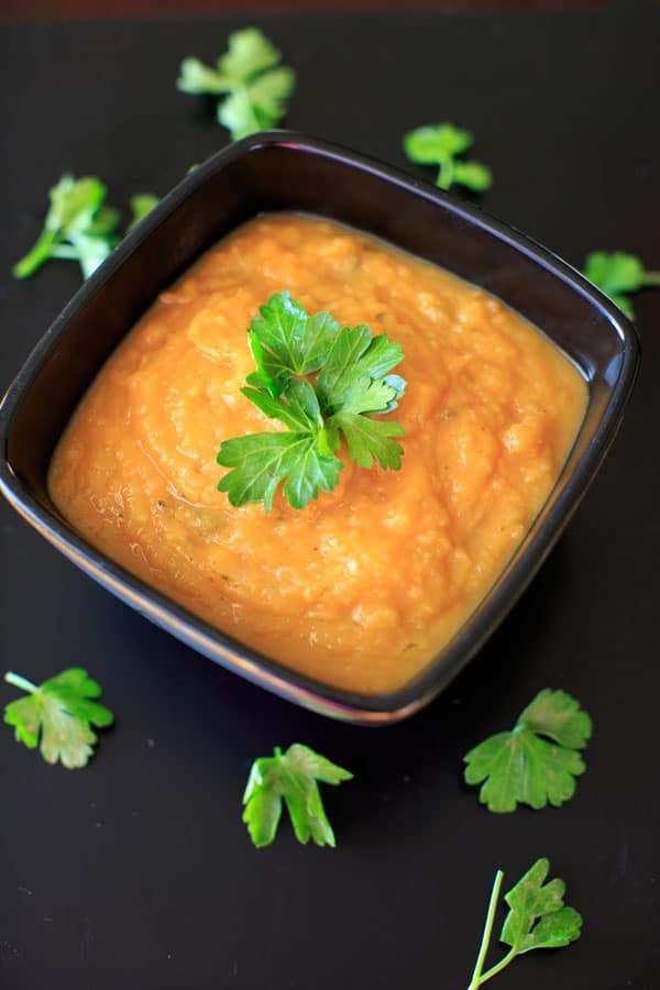 Sweet Potato and Apple Soup - only 4 main ingredients plus spices makes this a super simple and delicious thick soup for the colder months. 