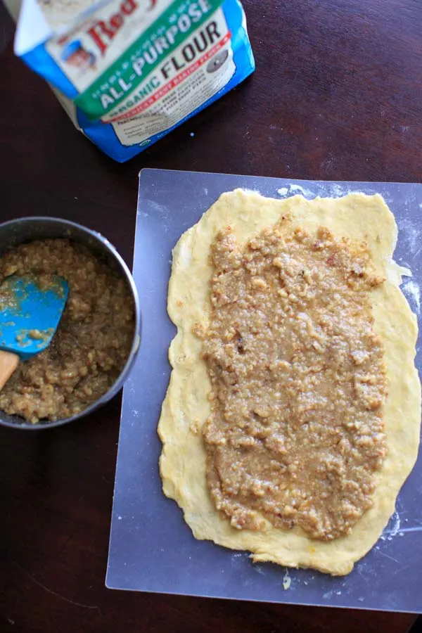 adding the nut filling to the dough