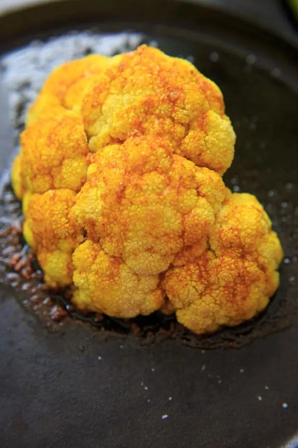 turmeric roasted cauliflower on cast iron