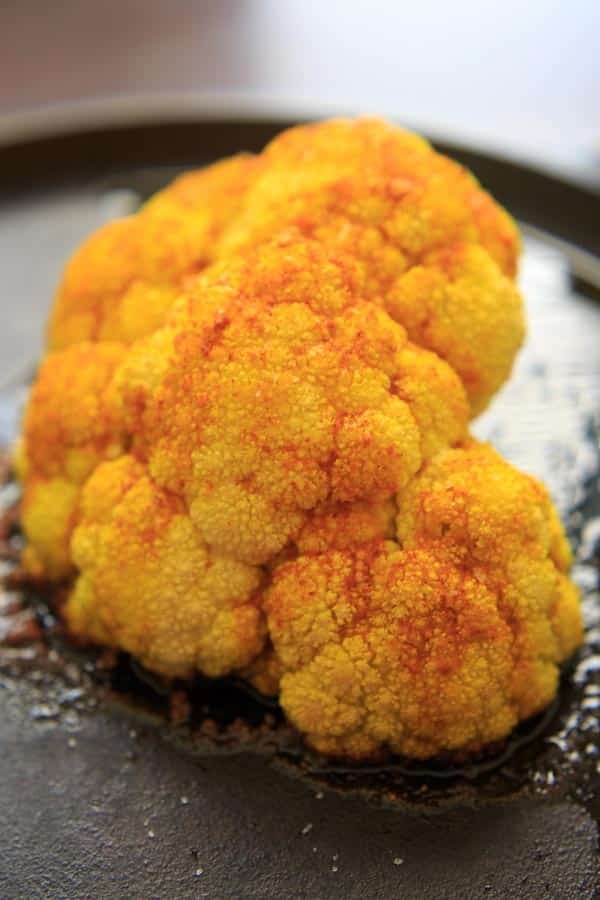 Turmeric Roasted Cauliflower on a cast iron pan