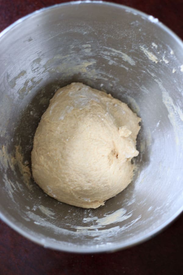Easy Homemade Pizza Dough - Make your own dough in less time than ordering in. Quick yeast dough will make dinner prep easy! 