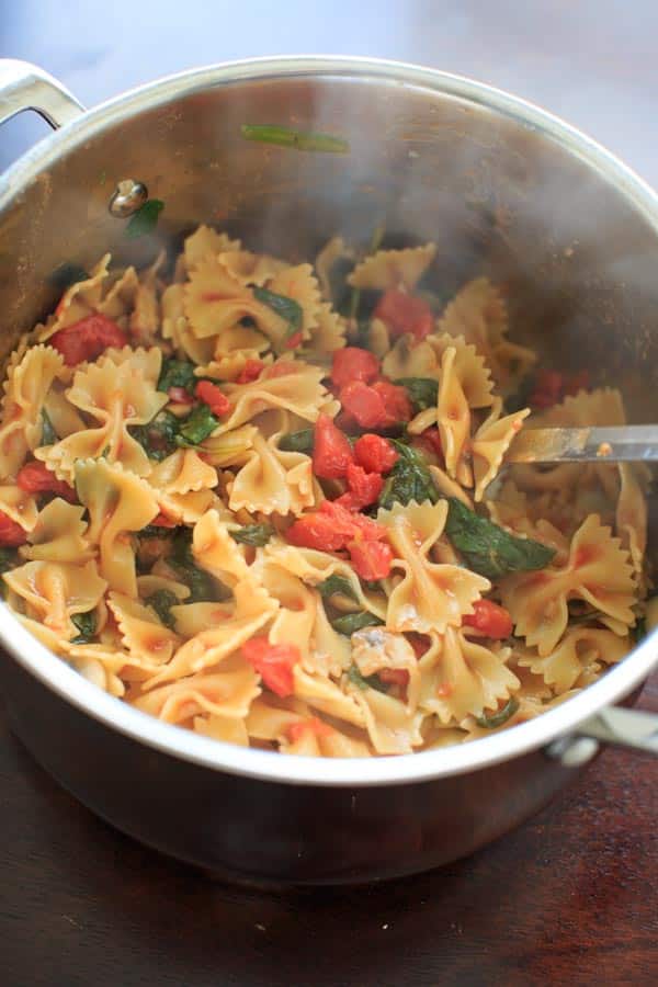 One Pot Spinach and Mushroom Bowtie Pasta. Vegan meal ready in less than 30 minutes!