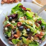 Italian Blue Salad - mixed greens served with blue cheese, honey roasted pecans, fresh blueberries and an apricot vinaigrette dressing.