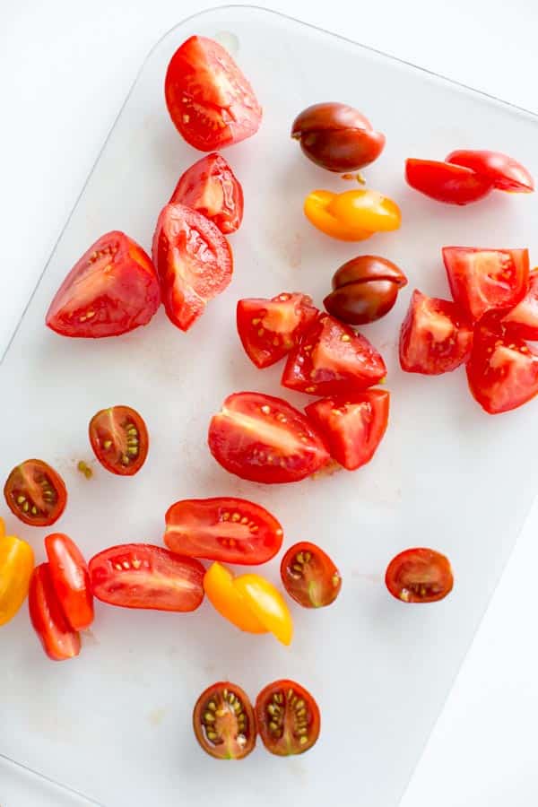 Simple Summer Tomato Salad. Healthy, light, delicious and portable so you can pack it to-go for all your summer adventures.