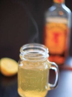 Fireball Hot Toddy - cinnamon whiskey, honey and lemon drink to melt your sickness away.