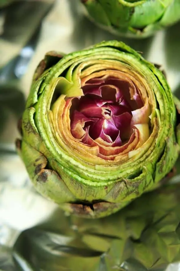 Lemon Garlic Roasted Artichokes - a simple and different way to cook this veggie side dish. Serve with melted butter or other favorite dip!