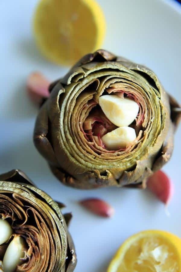 Lemon Garlic Roasted Artichokes - a simple and different way to cook this veggie side dish. Serve with melted butter or other favorite dip!